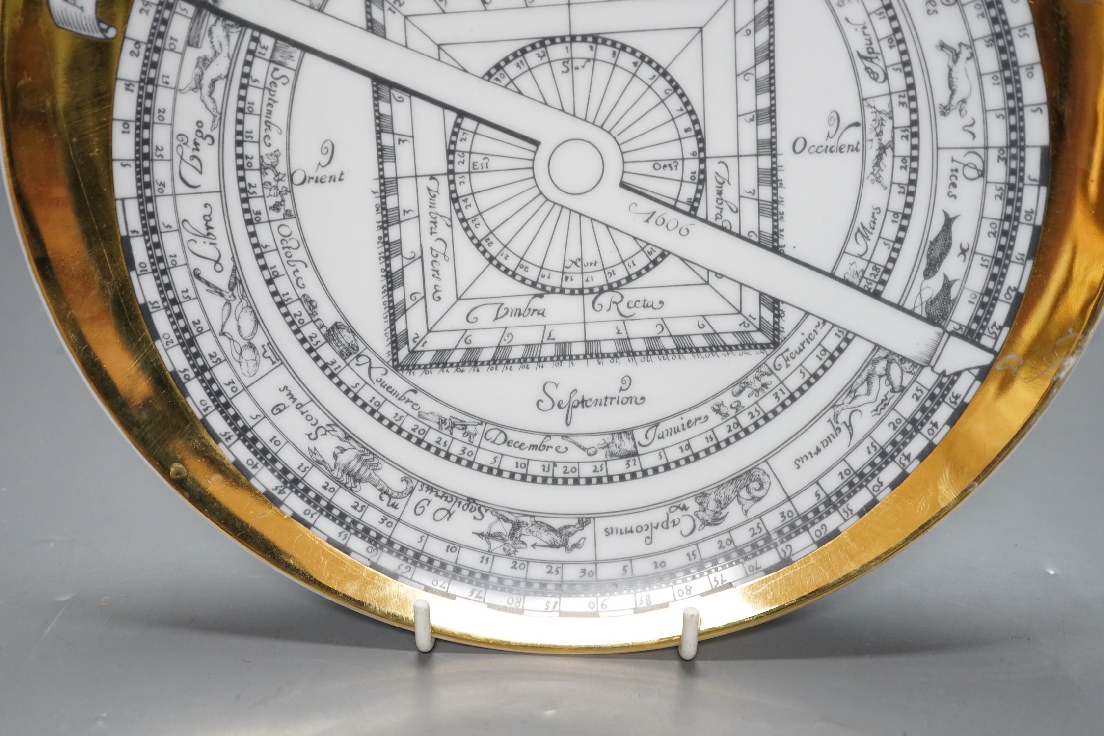 A Fornasetti ‘Astrolabio’ porcelain 1970 Christmas plate, 24cm diameter 24cm